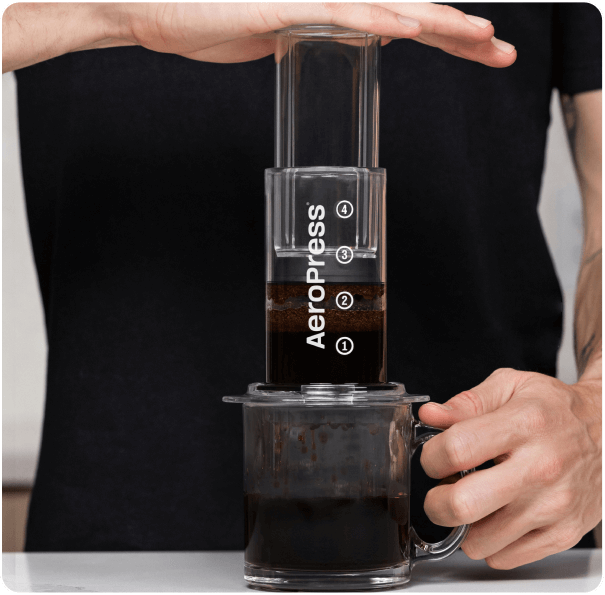 AeroPress Clear Coffee Maker & Flow Control Filter Cap Bundle